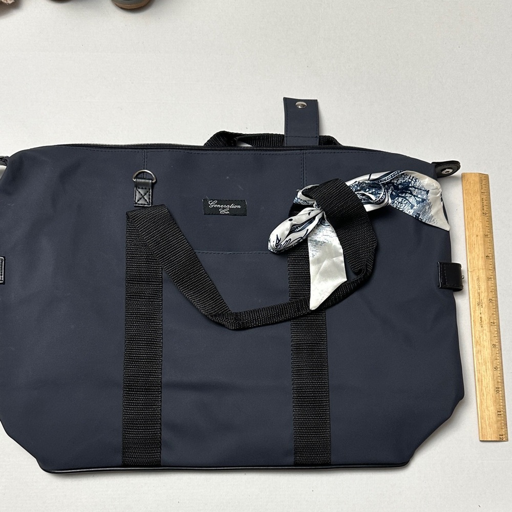 Elegant Navy Duffel Bag with Black Accents
